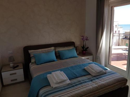 Ένα ή περισσότερα κρεβάτια σε δωμάτιο στο Mary's Penthouse