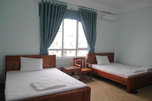 Giường trong phòng chung tại Hoang Yen Guesthouse