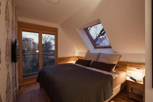 Postel nebo postele na pokoji v ubytování Arkona Residence