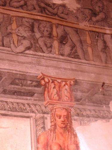 a statue of a woman on the ceiling of a building at Hotel Locanda Dei Mai Intees in Azzate