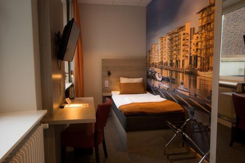 Ένα ή περισσότερα κρεβάτια σε δωμάτιο στο Dream - Luxury Hostel