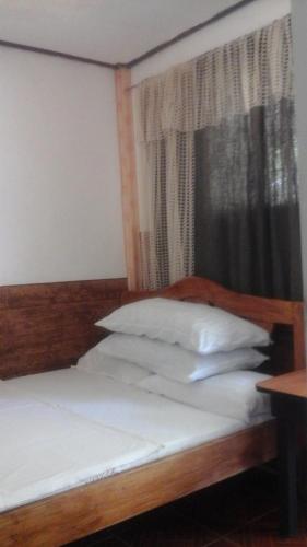Postel nebo postele na pokoji v ubytování Larmar bed and breakfast