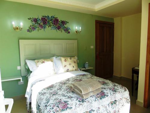Taboga Palace SPA Hotelにあるベッド