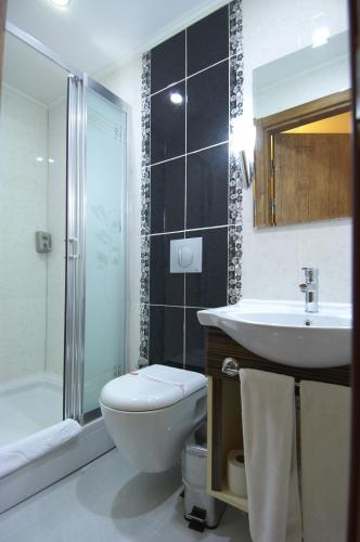 Salle de bains dans l'établissement Soyic Hotel