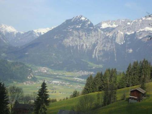 a view of a mountain range with a house on a hill at Appartementhaus Eberharter in Hart im Zillertal