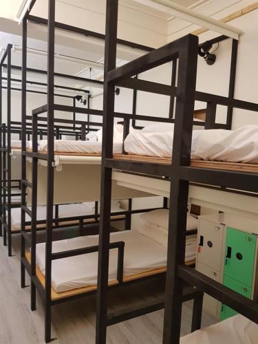 a group of bunk beds in a room at 履舍民宿Footinn in Taitung City