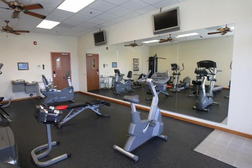 a gym with treadmills and elliptical machines at Garden Place Suites in Sierra Vista