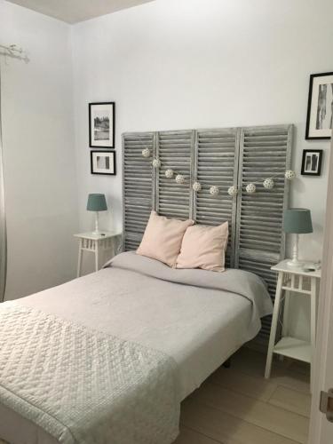 Postel nebo postele na pokoji v ubytování Apartamento Los Naranjos de Santa Justa