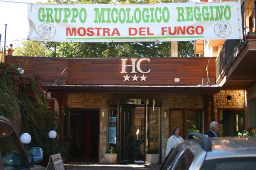a building with a sign for a restaurant at Hotel Centrale in Gambarie dʼAspromonte