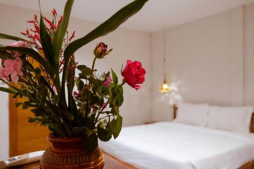 Postel nebo postele na pokoji v ubytování 7 Rooms Kohchang