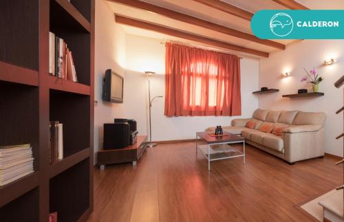 TV a/nebo společenská místnost v ubytování Fronton Whale Apartamentos