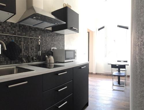 Kuchyň nebo kuchyňský kout v ubytování charming new loft
