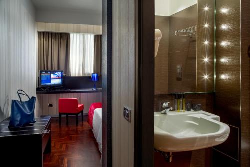 Ein Badezimmer in der Unterkunft Enea Hotel Pomezia