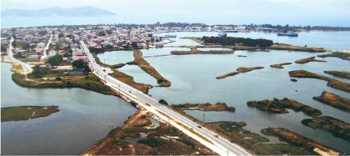 an aerial view of a bridge over a body of water at TETYK Keramoti Hotel Apartments in Keramotí