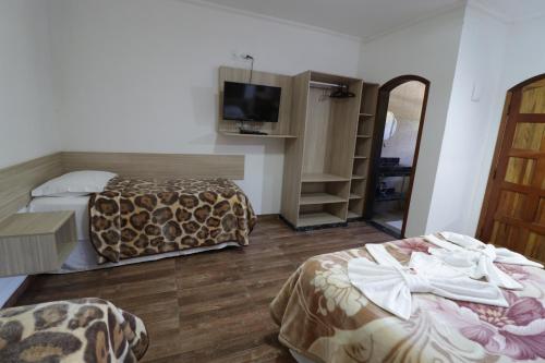 Katil atau katil-katil dalam bilik di Hotel Rural Vale das Nascentes