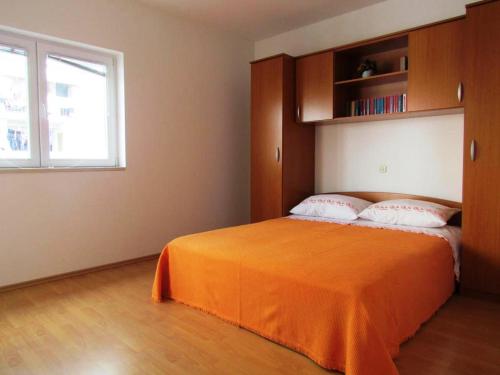 Ένα ή περισσότερα κρεβάτια σε δωμάτιο στο Urban Apartments Jadre