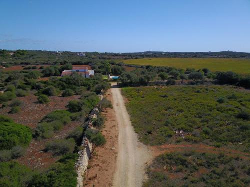 an aerial view of a dirt road in a field at Son Set Villa in Sant Lluis