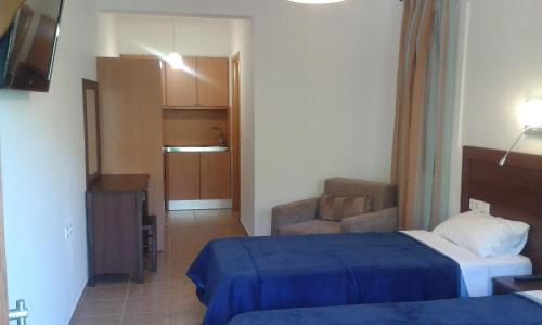 
Ένα ή περισσότερα κρεβάτια σε δωμάτιο στο Megalos Mourtias
