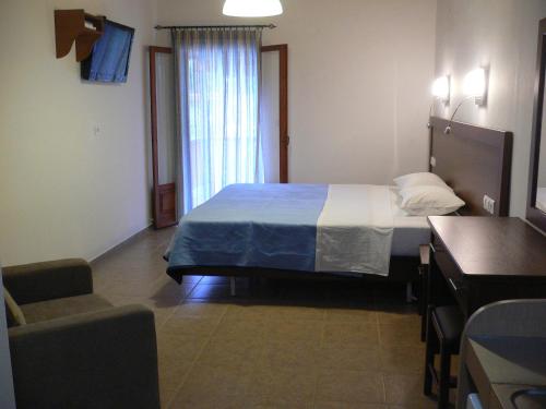 
Ένα ή περισσότερα κρεβάτια σε δωμάτιο στο Megalos Mourtias
