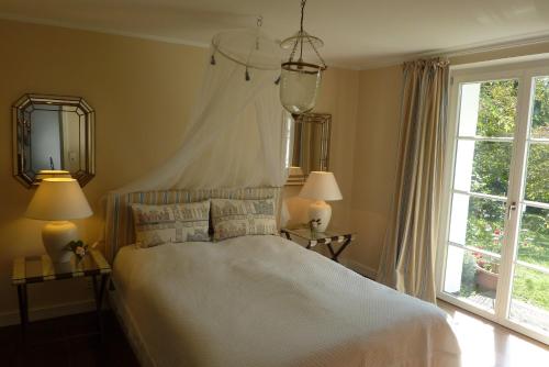 Cama o camas de una habitación en Villa Elmenhorst