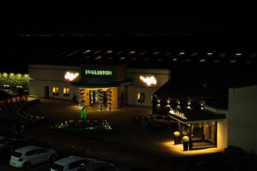 a model of a store at night with lights at Ingliston Country Club Hotel in Bishopton