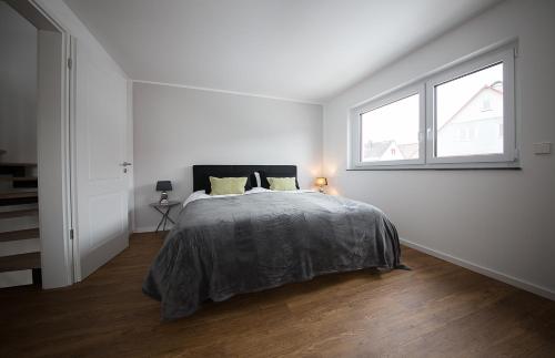 Ένα ή περισσότερα κρεβάτια σε δωμάτιο στο Ferienhaus Albert