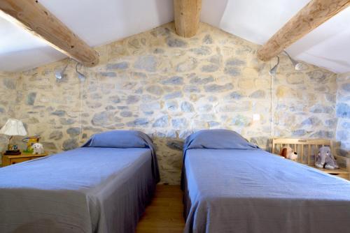 Katil atau katil-katil dalam bilik di La Bergerie