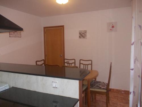 Televisyen dan/atau pusat hiburan di Apartamento en Sant Carlos de la Ràpita
