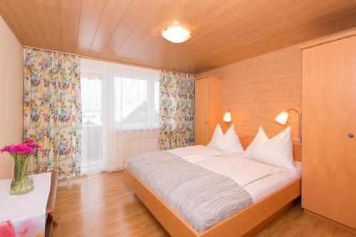 Postel nebo postele na pokoji v ubytování Appartement Roland