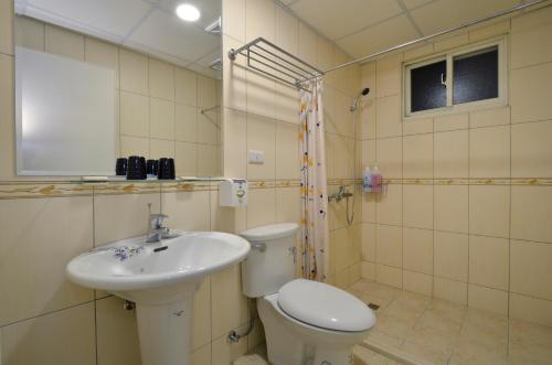 Ett badrum på Hoya Resort Hotel Chiayi
