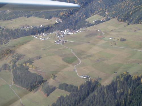 an aerial view of a field from an airplane at Pension Bichlgeiger in Anras