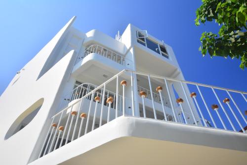 a balcony on a cruise ship against a blue sky at Mare Cielo in Xiaoliuqiu