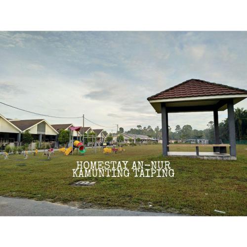 Сертификат, награда, вывеска или другой документ, выставленный в Homestay An-Nur Kamunting
