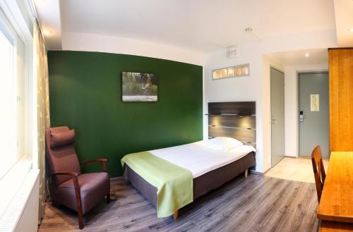 Postel nebo postele na pokoji v ubytování Finlandia Hotel Airport Oulu
