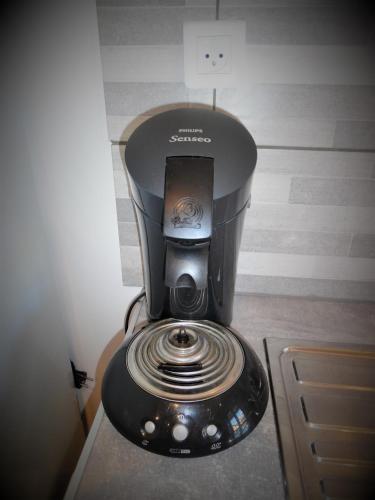 a blender sitting on top of a counter at L'Oriflamme in Avignon