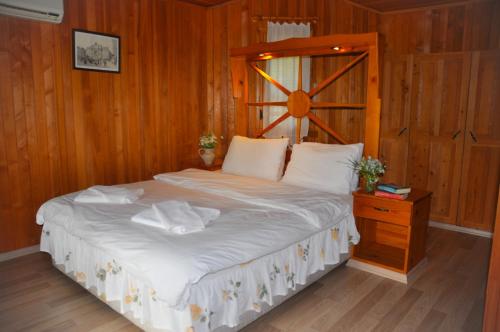 Postel nebo postele na pokoji v ubytování Arcadia Hotel