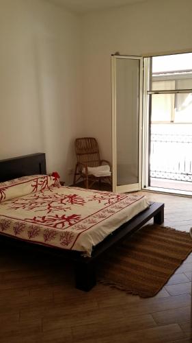 En eller flere senge i et værelse på Casa Sferracavallo
