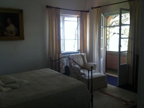 Ένα ή περισσότερα κρεβάτια σε δωμάτιο στο Villa Tregia