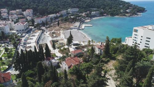 an aerial view of a beach and the ocean at Meridiens in Dubrovnik