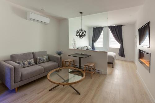 Coin salon dans l'établissement Les Lofts Ste-Anne