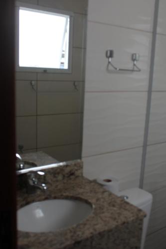 Koupelna v ubytování Rivero Hotel