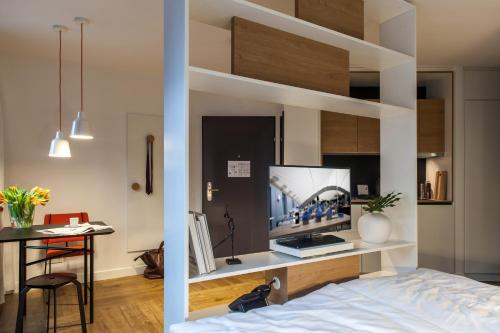 Postel nebo postele na pokoji v ubytování smartments Wien Hauptbahnhof - Serviced Apartments