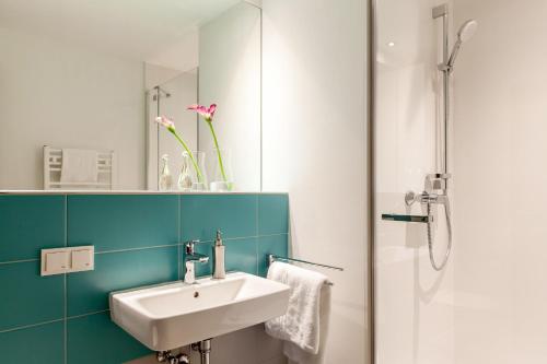Bathroom sa SMARTments business Wien Hauptbahnhof - Serviced Apartments