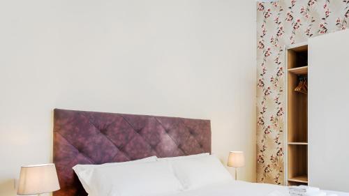 Cama ou camas em um quarto em Italianway-Bergonzoli Place