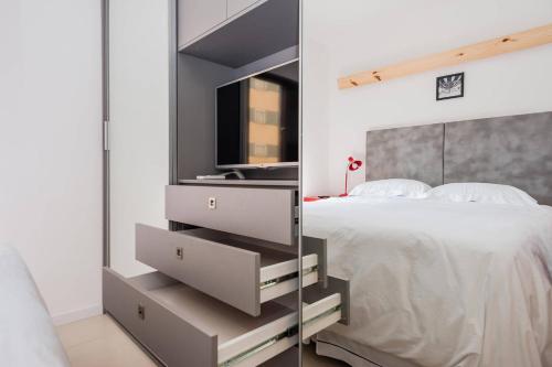 Кровать или кровати в номере BHomy Jardins Moderno e descolado MA206