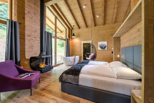 Krevet ili kreveti u jedinici u okviru objekta LA SOA Chalets & Eventlodge