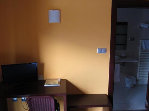 Euba Hotelにあるテレビまたはエンターテインメントセンター