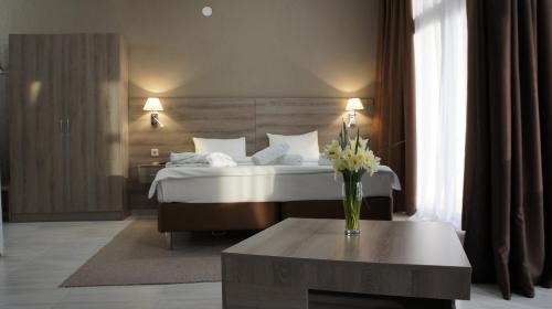 Cama o camas de una habitación en Hotel Bereg Evkaliptov