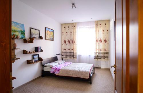 Ένα ή περισσότερα κρεβάτια σε δωμάτιο στο Art-House