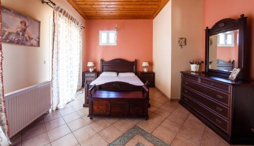 Letto o letti in una camera di Villa Nina